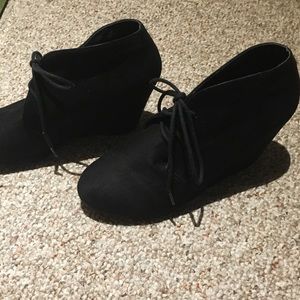 Black wedge booties